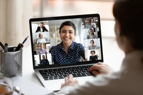Teacher conducting an online class, showcasing the 7 best online teaching programs to boost your career.