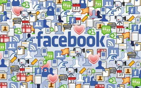 A teacher using Fb on a laptop to connect with students online, with icons for likes and comments.