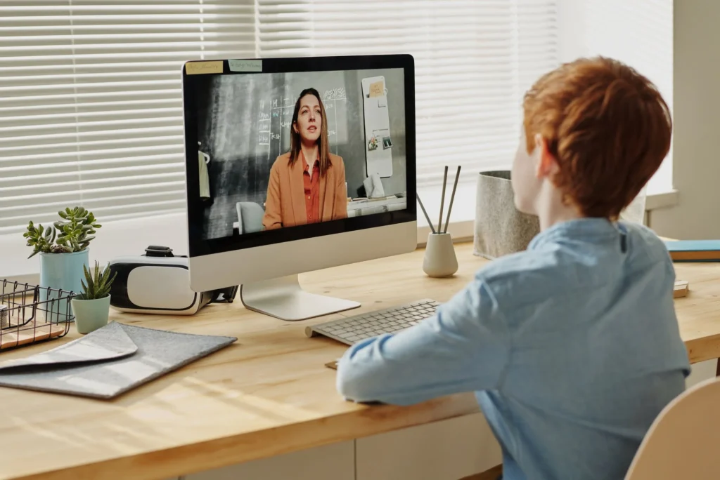 Professional online teacher interacting with students on a virtual platform, representing the opportunities available on Teacheron for educators worldwide.