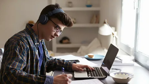 Student exploring online work for students opportunities, balancing earning and studying.